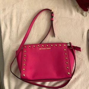 Michael Kors pink crossbody. Great condition with few subtle markings (see pics)